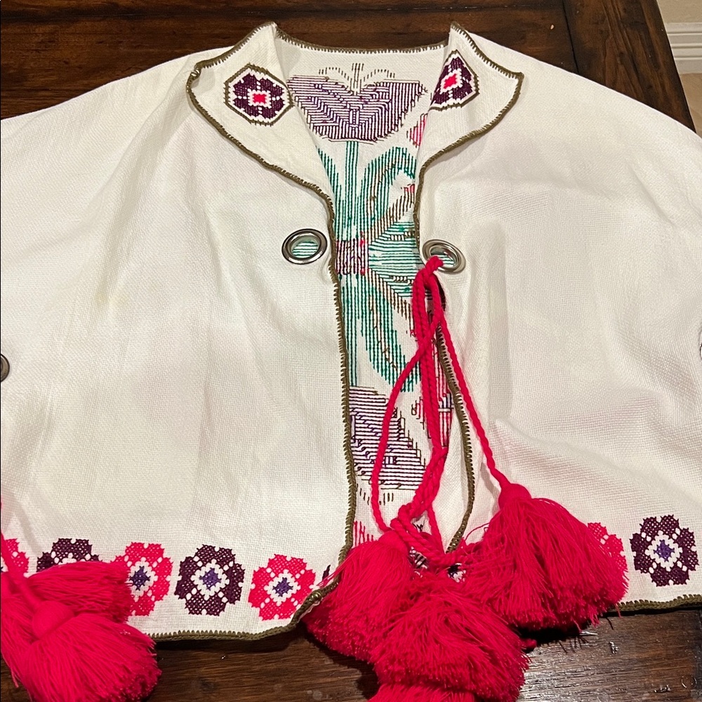 White Jacket with Red Tassels and Floral Embroidery Handmade in Mexico .